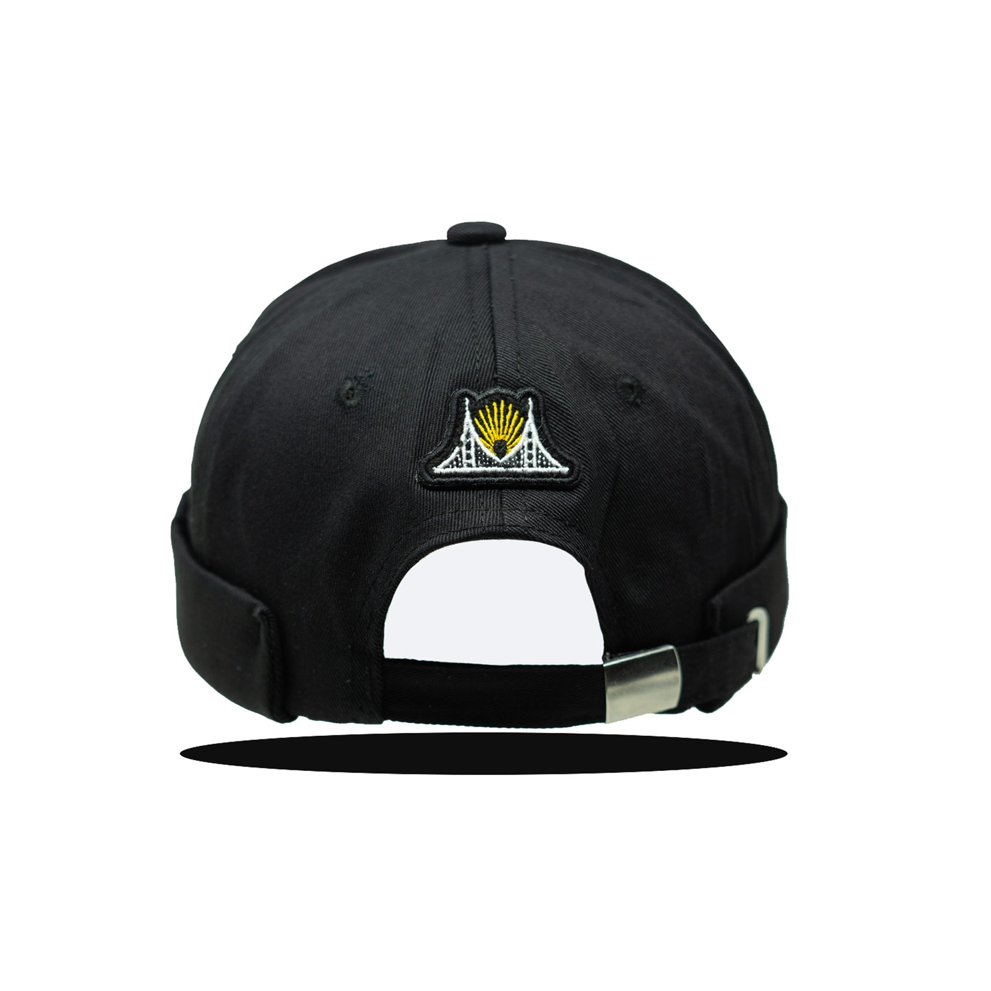 Black docker or bowl hat with the silhouette bay bridge logo on the back of the hat. 