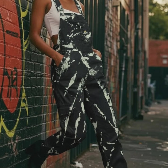 model in black tie dye overalls
