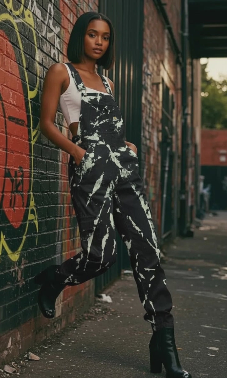 model in black tie dye overalls